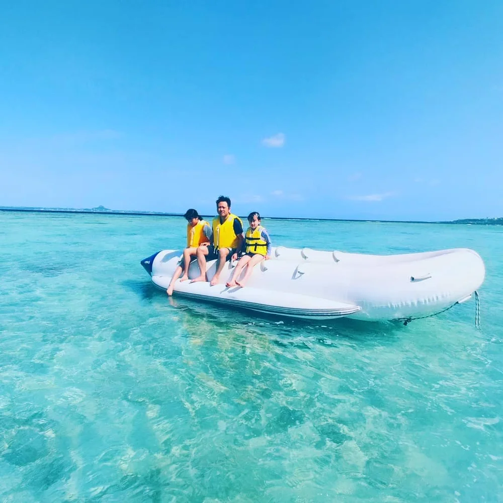 Sea Surface Gliding in Okinawa’s Sesokojima Area! Banana Boat or Big Mable Experience