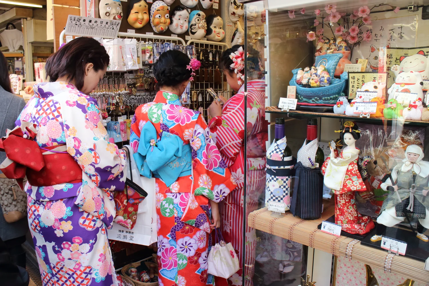Ladies enjoy shopping in kimonos at Asakusa street.