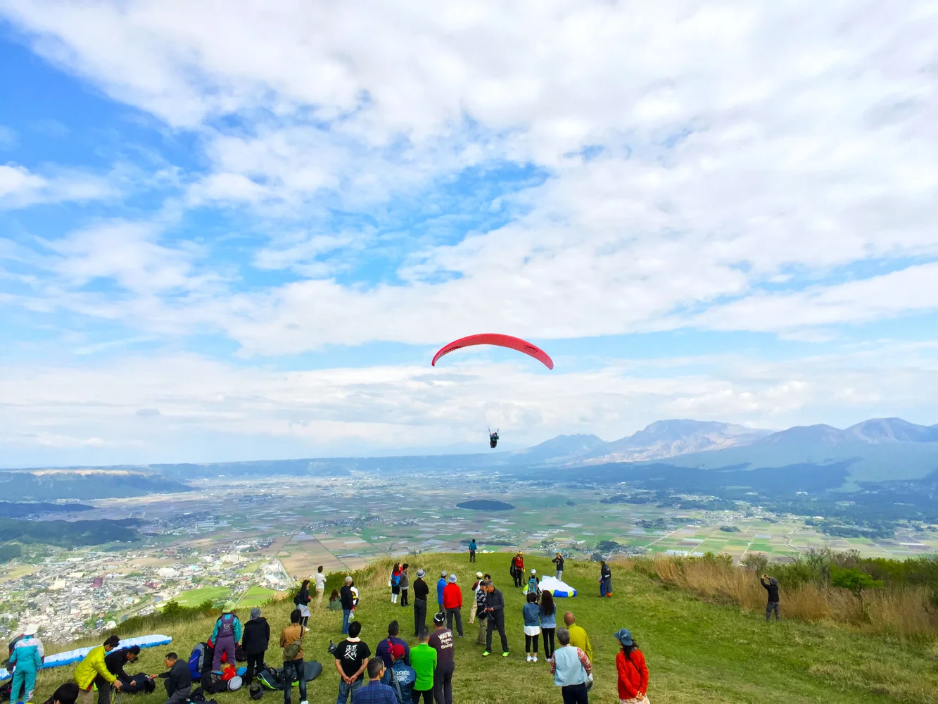 Paraglide Over Daikanbo & the Five Peaks of Aso in Kumamoto
